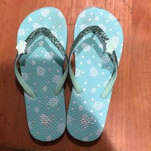 Turquoise flip flops